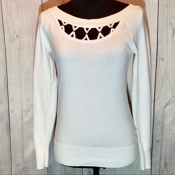 Jennifer Lopez Tops - Jennifer Lopez Sweater.     219